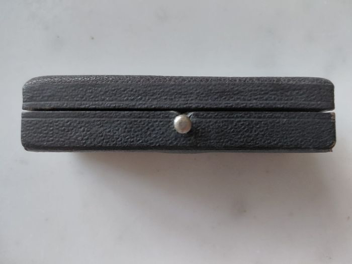 Antique medical syringe in original box