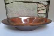 Brown glazed oval bowl