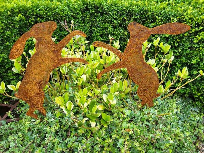 corten steel boxing hares