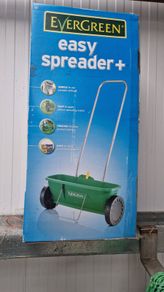 Grass seed spreader