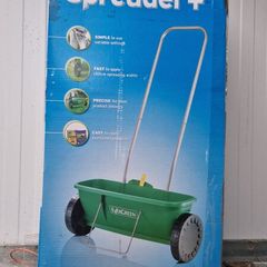 Grass seed spreader