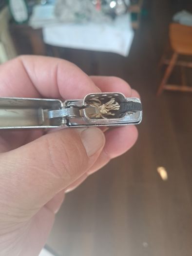 Champ Flip top petrol lighter.