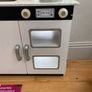 kids play kitchen by Plum with wooden food accessories Image 3