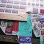 A small box with collection of stamps from overseas. Image 6