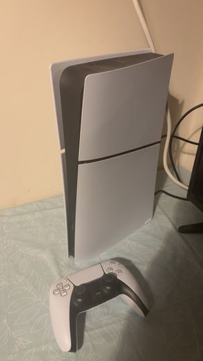 Ps5 digital edition with controller and cables about 4 months old in perfect condition and no issues whatsoever barely used console.  Open to offers