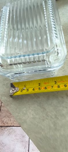 Vintage glass kraft square butter cheese dish lid glass Insert 15.00 euro.Vintage Pasabahce clear glass butter dish 24.00 euro, Fleur De Lis Cast Iron Door Stop Wedge Antique gold Black 4x3.5x7.75 Inch 34.00 euro , Vintage Englshe browne larg milk jug 18.