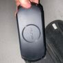 PSP street E1000 with charger and games Image 4