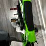 Boys green bike Image 2