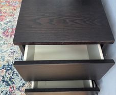 black-brown IKEA MALM chest of 2 drawers with black glass top