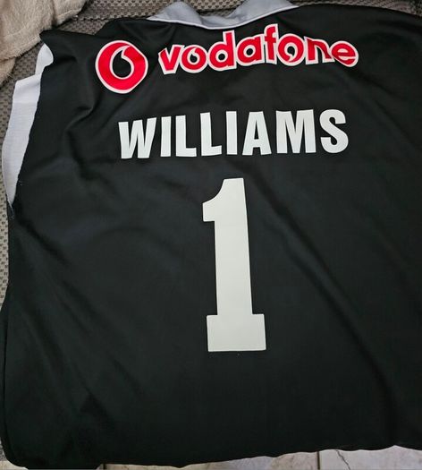 Robbie williams signed book and Jersey