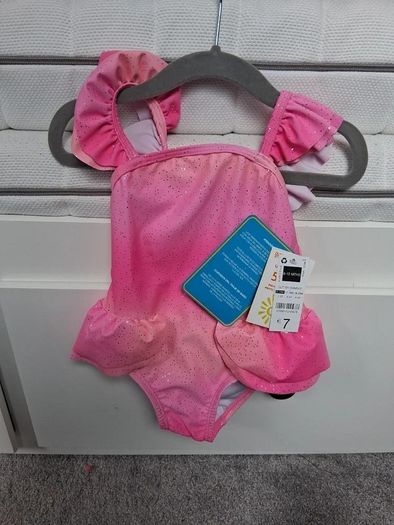 Brand New with tags Pink glitter Tutu style swimsuit age 9-12 months