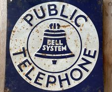 Vintage metal public telephone sign