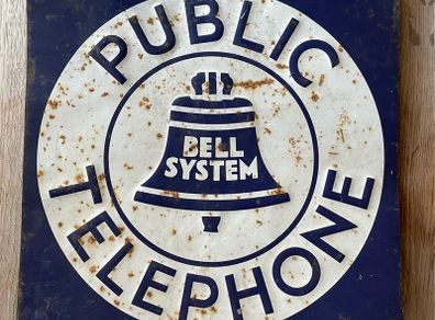 Vintage metal public telephone sign