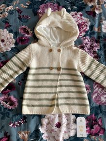 New- baby jumper size 9-12 months