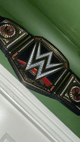 WWE title autographed by Kurt angel