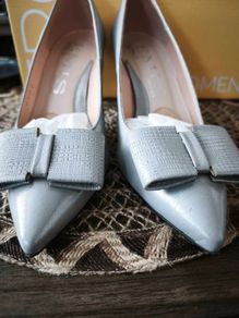 Emis silver shoes size 5.