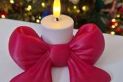 Bow candle holder