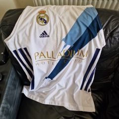 2 men's Arsenal t-shirts 1Real Madrid