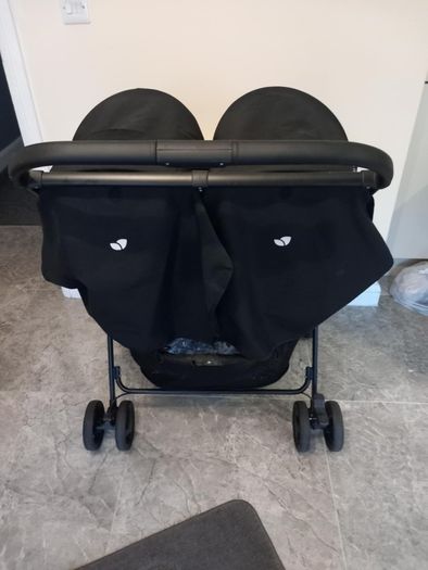 Joie double baby's buggie with rain covers