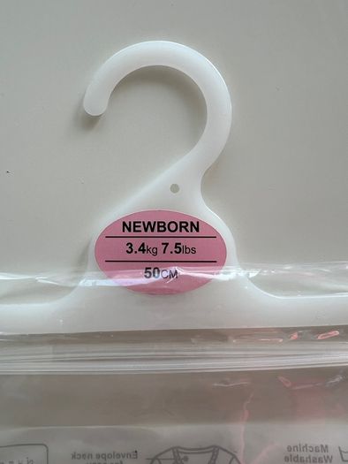 4 brand new Newborn Bodysuits