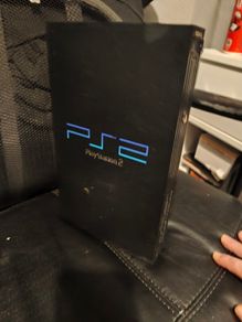 Playstation 2 w/controllers,memory cards