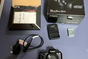 canon G5x complete in box as new. Only set up but never used . Spare camera