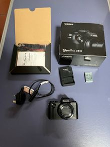 canon G5x complete in box as new. Only set up but never used . Spare camera
