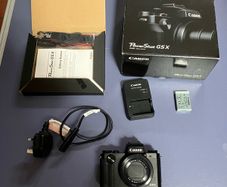 canon G5x complete in box as new. Only set up but never used . Spare camera
