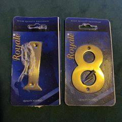 Vintage brass door numbers