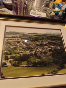 Framed print of air of village may be enniskerry Co. Wicklow.
