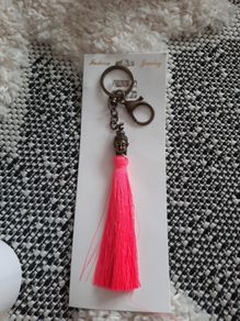 bright pink buddha keychain