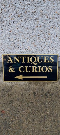 Antiques & Curios,hard plastic sign perspex. ,unusual and lovely colours,,32 inches length, 16 inches height,,buyer collects, see pictures for condition, used condition few marks nicks