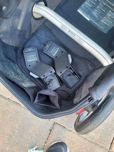 Uppababy Cruz V2 with newborn insert and adapters