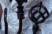2 black curtain hold backs