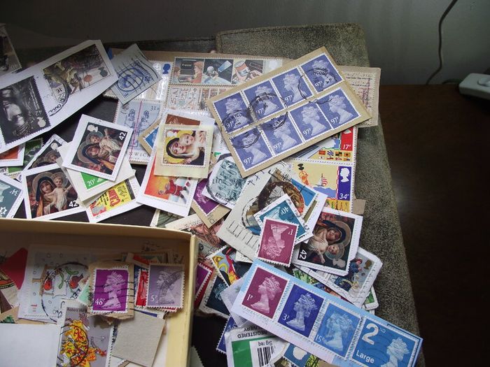 A box with collection of stamps from Great Britain