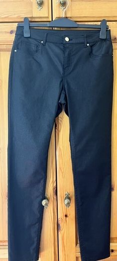 Faux Leather JET BLACK Ladies Slender Ankle Grazer Trousers.  H&M Size 12. Slight Stretch. Dressy With A Satin/sheen Finish. Immaculate Off The Rail Condition.