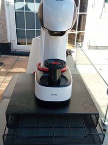 Dolce Gusto coffee machine with pod holder