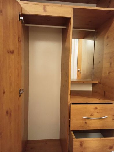 Pine finish Combination wardrobe with hanging  space, closed & open shelving, mirror, 3 lower drawers