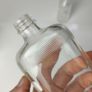 333 - Set of 3 Vintage Clear Glass Collectible Decorative Ribbed Bottles Image 6
