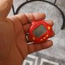 vintage  dinkie dino red tamagotchi Image 3