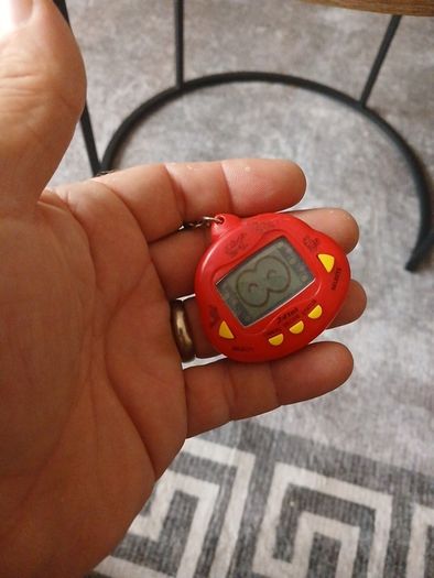 vintage  dinkie dino red tamagotchi