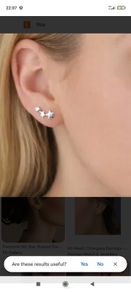 Silver toned triple star,climbing earrings