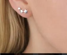 Silver toned triple star,climbing earrings