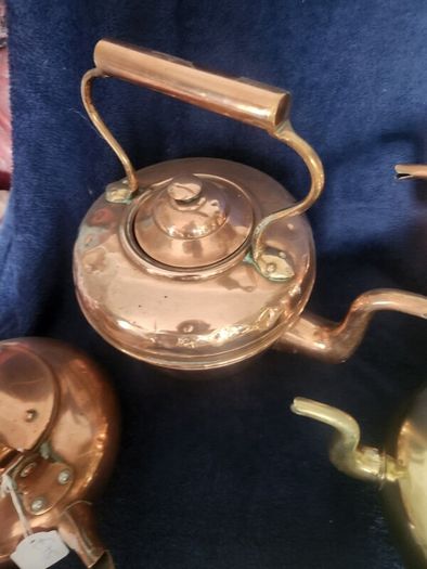 Vintage brass and cpper kettles. polished and beautiful.