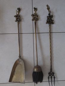 Antique French fireplace set 1950s features handles with various figures with animal finials