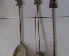 Antique French fireplace set 1950s features handles with various figures with animal finials