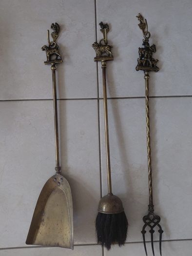 Antique French fireplace set 1950s features handles with various figures with animal finials