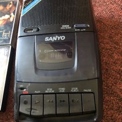 tape player and an assortment of cassettes