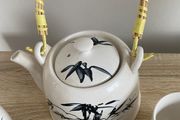 Herbal teapot  and six matching  teacups