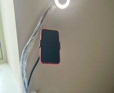 A Phone Stand with a supplementary Blue Light